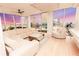 Bright living room with floor to ceiling windows showcasing a stunning city view at 1280 W Peachtree Nw St # 4003, Atlanta, GA 30309