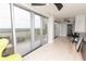 Living area with balcony and large windows providing bright light and views at 1280 W Peachtree Nw St # 4003, Atlanta, GA 30309