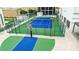 Community rooftop outdoor sports court features a basketball court and tennis court for recreation at 1280 W Peachtree Nw St # 4003, Atlanta, GA 30309