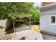 Carport area with brick driveway and wooden structure at 1463 Macklone Ne St, Atlanta, GA 30307