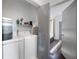 Laundry area with white washer and dryer and access to the bedroom at 1463 Macklone Ne St, Atlanta, GA 30307