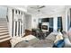 Spacious living room with modern decor, fireplace, and large gray sectional sofa, perfect for relaxation and entertaining at 1463 Macklone Ne St, Atlanta, GA 30307