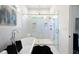 Stunning bathroom features walk-in shower with bench, soaking tub, and granite counters at 1463 Macklone Ne St, Atlanta, GA 30307