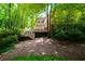Exterior view showing the deck with backyard greenery at 1781 Point Pleasant Se, Smyrna, GA 30080