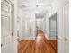 Bright hallway features gleaming hardwood floors and elegant trim at 1781 Point Pleasant Se, Smyrna, GA 30080