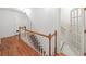 Second floor hallway with wood floors, stairs, wood railing and wainscoting at 1781 Point Pleasant Se, Smyrna, GA 30080