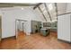 Open kitchen with vaulted ceiling, kitchen island, and stainless steel appliances at 1781 Point Pleasant Se, Smyrna, GA 30080