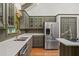 Modern kitchen features stainless steel appliances and ample counter space at 1781 Point Pleasant Se, Smyrna, GA 30080