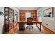 Dedicated home office with custom bookshelves and a spacious desk at 1781 Point Pleasant Se, Smyrna, GA 30080