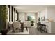 Open-concept living area seamlessly connects dining, living, and kitchen spaces at 2479 Cotton Ln, Douglasville, GA 30135