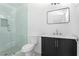 Bathroom featuring a glass shower, vanity, and modern finishes at 2879 Harlan Dr, Atlanta, GA 30344