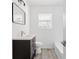 Updated bathroom featuring vanity, tub, and modern subway tile at 2879 Harlan Dr, Atlanta, GA 30344