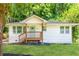 Charming single-story home with a welcoming front porch and fresh white exterior at 2879 Harlan Dr, Atlanta, GA 30344