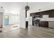 Open layout showcasing the kitchen with stainless steel appliances and living area at 2879 Harlan Dr, Atlanta, GA 30344