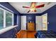 Bedroom featuring a ceiling fan, hardwood flooring, and natural light at 10535 Willow Meadow Cir, Alpharetta, GA 30022