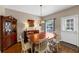 Classic dining room with a wood table and sideboard cabinet at 10535 Willow Meadow Cir, Alpharetta, GA 30022