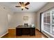 Well-lit office space with natural light and a ceiling fan at 10535 Willow Meadow Cir, Alpharetta, GA 30022