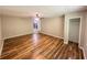 Bedroom featuring hardwood flooring and a walk-in closet at 180 Bishop Nw Rd, Cartersville, GA 30121