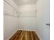 Walk-in closet with wooden floor and wire shelving for efficient storage solutions at 180 Bishop Nw Rd, Cartersville, GA 30121