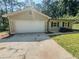 Attached two-car garage showcasing a clean driveway and well-maintained exterior at 180 Bishop Nw Rd, Cartersville, GA 30121