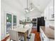 Cozy dining area with backyard access and a view into the kitchen at 2140 Hurt Sw Rd, Marietta, GA 30008