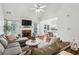 Spacious living room featuring a fireplace and open layout to dining area at 2140 Hurt Sw Rd, Marietta, GA 30008