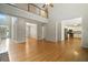 Open-concept living area features hardwood floors and lots of natural light at 2832 Windrush Dr, Buford, GA 30518