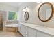 Bright main bathroom features dual sinks, soaking tub and walk-in shower at 2832 Windrush Dr, Buford, GA 30518