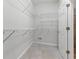 Walk-in closet with carpet and wire shelving at 2832 Windrush Dr, Buford, GA 30518