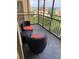 Relaxing screened in balcony with city views and outdoor seating at 300 Peachtree Ne St # 11I, Atlanta, GA 30308