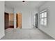 Spacious bedroom with neutral carpet, and multiple doorways with views to a bathroom and hallway at 1273 Harvest Park Ln, Suwanee, GA 30024