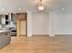 Open-concept living space featuring hardwood floors and ample natural light at 1273 Harvest Park Ln, Suwanee, GA 30024