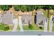 Aerial view showcases the home's manicured lawn, driveway, and neighborhood at 405 Blue Sky Circle Cir, Acworth, GA 30102