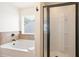 Bathroom featuring a tub and a shower at 405 Blue Sky Circle Cir, Acworth, GA 30102