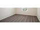 Bedroom with neutral carpet, freshly painted walls, and a view from the window at 405 Blue Sky Circle Cir, Acworth, GA 30102