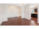 Spacious dining area showcasing hardwood flooring and views to the kitchen at 405 Blue Sky Circle Cir, Acworth, GA 30102