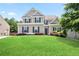 Charming two-story home with manicured lawn and lush landscaping at 405 Blue Sky Circle Cir, Acworth, GA 30102