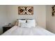 Comfortable bedroom featuring a black metal frame bed and decorative wall art at 4312 Daniel Dr, Winston, GA 30187