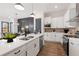 Modern kitchen with stainless steel appliances and an open layout adjoining the dining area at 945 Willingham Dr # 3, Hapeville, GA 30354