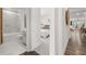 Elegant bathroom showcases a tub with marble tiling, modern fixtures, and bright light at 98 Keown Loop, Sharpsburg, GA 30277