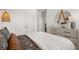 Serene bedroom showcasing natural light, elegant decor, and comfortable furnishings at 98 Keown Loop, Sharpsburg, GA 30277