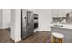 Kitchen features stainless steel appliances, a kitchen island and plenty of counter space at 98 Keown Loop, Sharpsburg, GA 30277