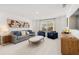Open living area with plush seating, stylish decor, and plenty of natural light at 98 Keown Loop, Sharpsburg, GA 30277