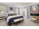 Serene main bedroom with ample natural light, neutral colors, and ensuite bathroom at 98 Keown Loop, Sharpsburg, GA 30277