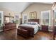 Bright and airy bedroom with hardwood floors, large windows, and vaulted ceiling at 105 Laurel Canyon Trl, Canton, GA 30114