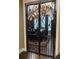 Ornate iron door leading to dining area at 105 Laurel Canyon Trl, Canton, GA 30114