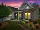 Charming home featuring stone and shingle accents, a well-manicured lawn, and a cozy covered porch at 105 Laurel Canyon Trl, Canton, GA 30114