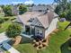 Charming single-Gathering home featuring stone accents, a covered porch, and lush landscaping at 105 Laurel Canyon Trl, Canton, GA 30114