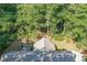 Aerial view of the home and surrounding lush greenery at 1252 Grist Mill Dr, Acworth, GA 30101