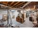 Large unfinished basement with exposed ducts and wooden support beams at 1252 Grist Mill Dr, Acworth, GA 30101